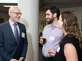 Three people talking about planned giving. Links to Gifts of Appreciated Securities
