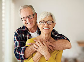 Photo of a man and woman smiling. Link to Life Stage Gift Planner Ages 60-70 Situations.